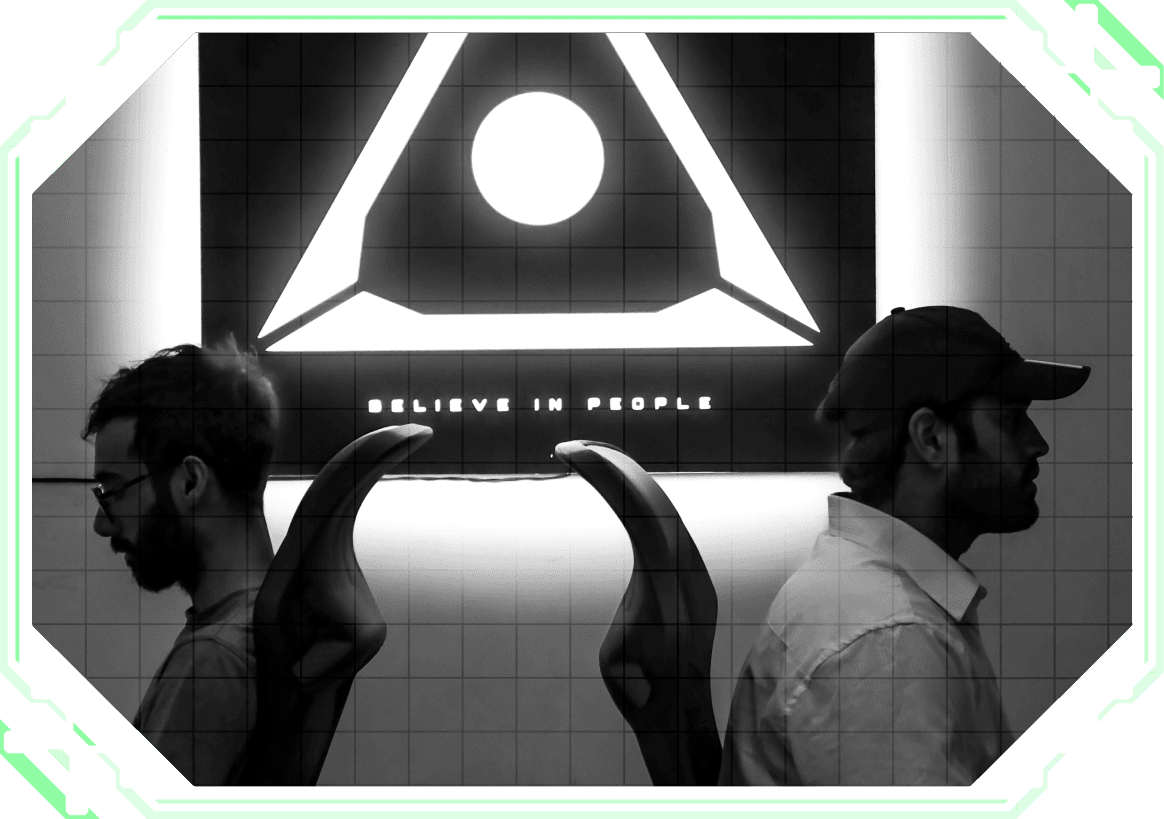 Picture of New Web Order Founders Saif and Musa sitting together infront on company logo